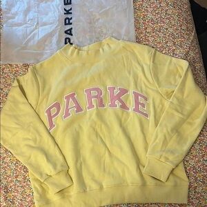 Parke Pastel Yellow Crewneck Sweatshirt with Pink Arch Logo